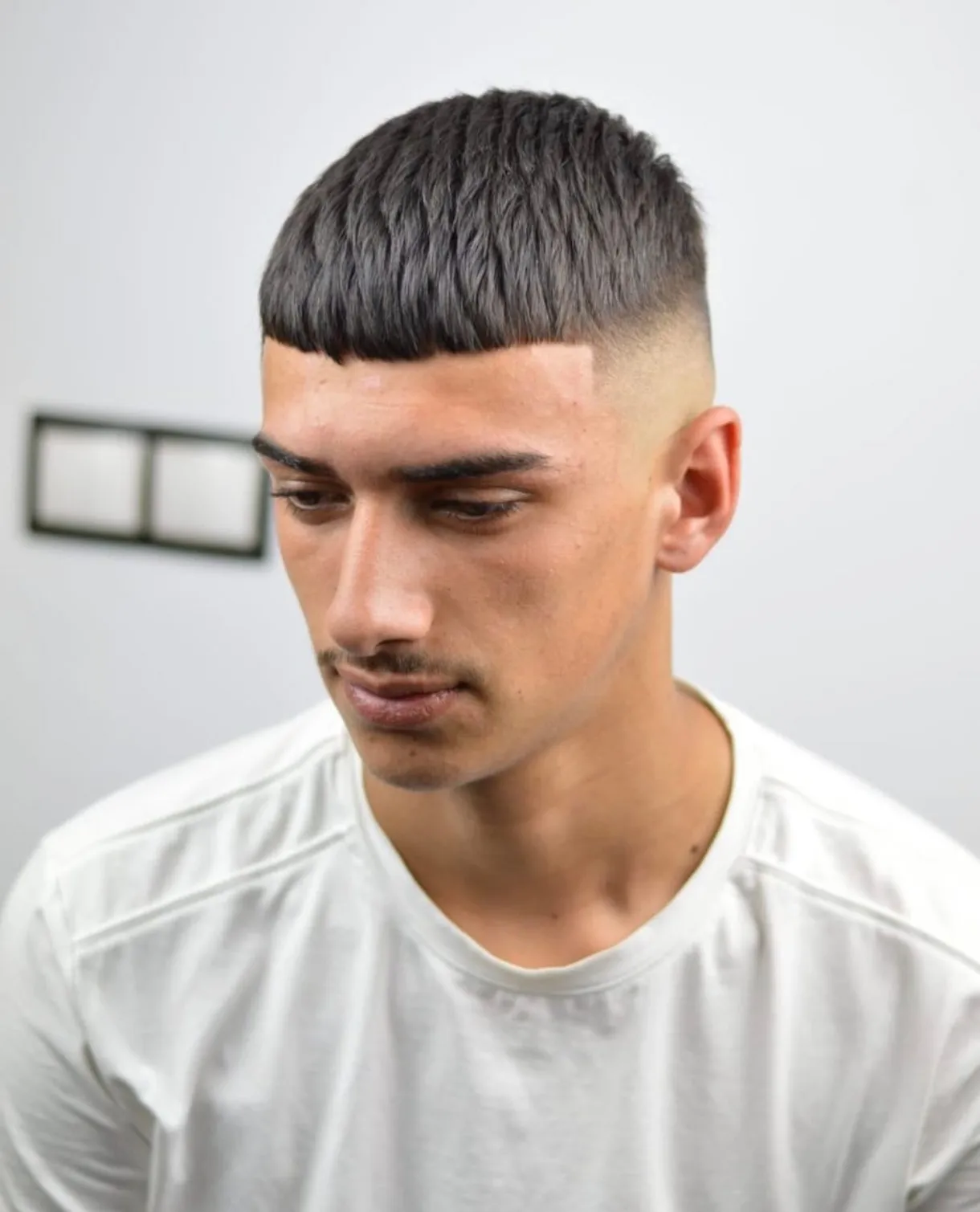 Corte de pelo moderno en barbería Franchy Barber